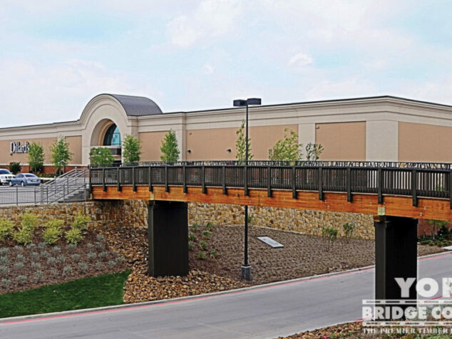 Uptown Village Pedestrian Bridge - Cedar Hill, TX | York Bridge Concepts - Timber Bridge Builders