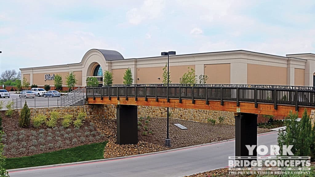 Uptown Village Pedestrian Bridge - Cedar Hill, TX | York Bridge Concepts - Timber Bridge Builders