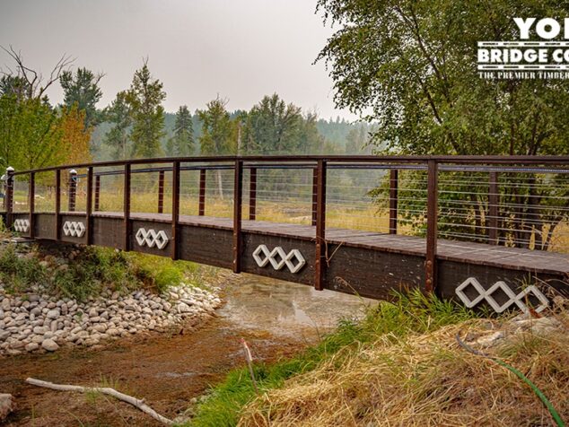 side view deck view Montana Private Residence timber bridge