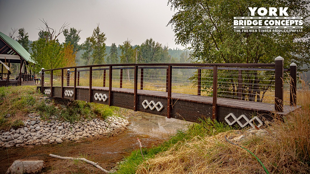 side view deck view Montana Private Residence timber bridge