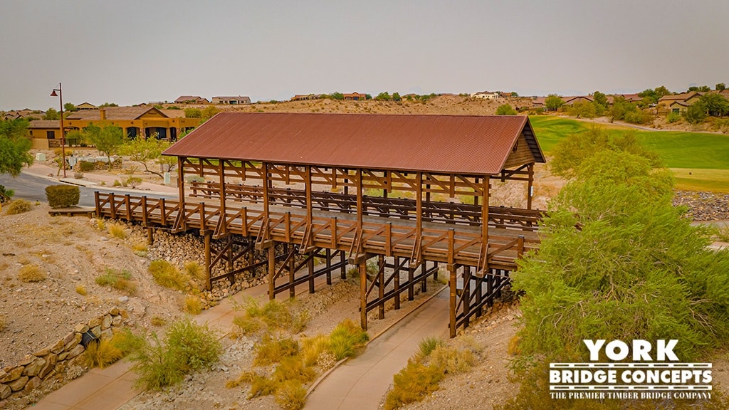 YBC Covered vehicular with attached pedestrian covered timber bridge in Texas