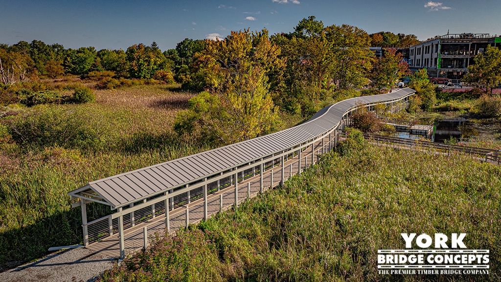 Douglas Gates Elementary School Pedestrian Timber bridge with cover- Acton, MA