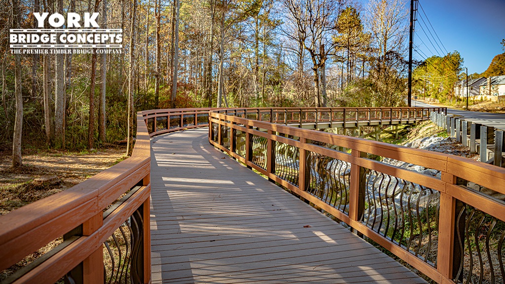 Long view Lucky Shoals Pedestrian Timber Bridge in Norcross, GA