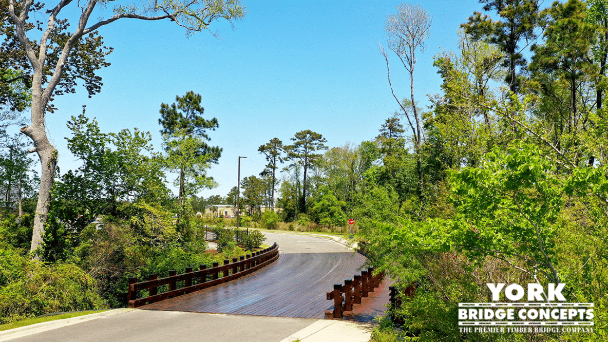 Ocean Isle Multiple Span with Glulaminated Stringers. Over Wetland. Ocean Isle Decero Design Classic Series Timber Bridge