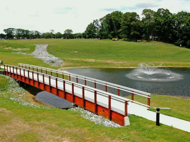 Opposite profile image for the Heatherwood Spy Glass Golf & Villas Pedestrian Timber Bridge by York Bridge Concepts in Setauket, NY