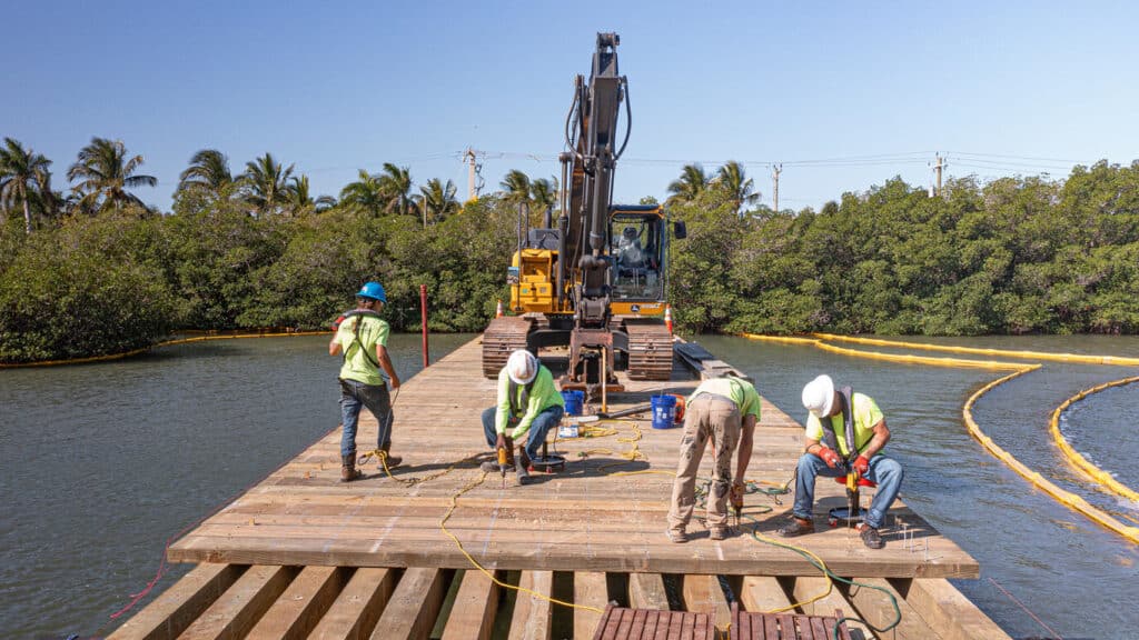 Comparing the construction time for a timber built bridge vs. a steel built bridge.